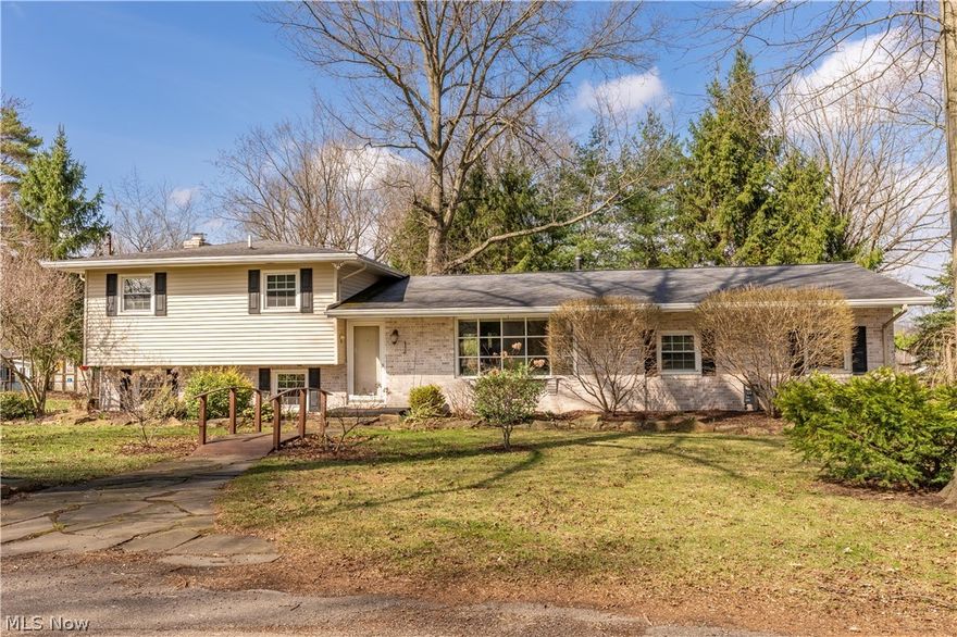 Spacious split-level home tucked in a charming neighborhood! This well-maintained property offers over 1,700 sq ft of bright, inviting living space with 3 bedrooms and 2 full baths. Step inside to a welcoming great room, where a large bay window fills the space with natural light and panel molding adds character and dimension. The eat-in kitchen features a sleek black tile backsplash, breakfast bar, and an open dining area with sliding glass doors leading to an oversized deck perfect for morning coffee or evening gatherings. Designed with entertaining in mind, the backyard is your private retreat, complete with a deck, patio, shed, and thoughtful landscaping. Upstairs, you’ll find three comfortable bedrooms and a full bath with a jetted tub/shower combo, vanity, and linen storage. The lower level offers a cozy family room with a feature stone wall, a gas fireplace with an electric starter, and walk-out access to the patio. Just off the family room is a versatile office space and a second full bath with a standing shower. An unfinished basement provides additional storage and a laundry space with a dual utility sink. Recent updates include a new AC, a new furnace, a new hot water tank, and a new fridge. Don’t miss your opportunity to call this home. Schedule your private showing today!