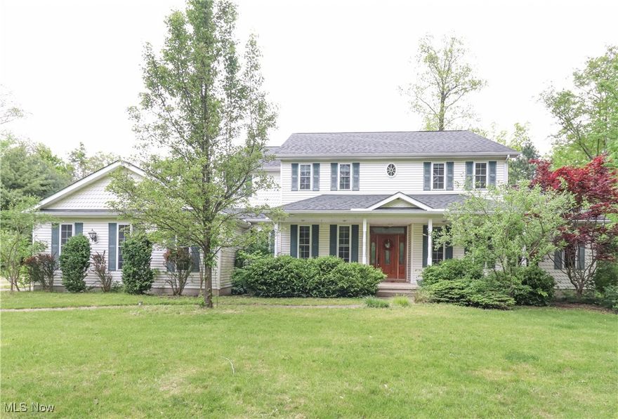 Newly listed on a wooded 3.7441 acre lot at the end of the cul-de-sac is this luxurious home with 3,041 Sq Ft of finished living space.  From the main entrance is a decorative foyer leading to the high ceiling family room with a cozy fireplace and a formal dining room with tray ceilings, Wood floors, and crown molding.  The spacious kitchen has plenty of countertop and cabinet space featuring a stainless Kitchen Aid Oven, Range with hood, and Dishwasher.  The Bar Room has a decorative wood bar with sink and French doors at the entrance.  The Master Bedroom and Bathroom has a walk-in closet, His and Hers sinks, a jetted soaking tub, and shower.  There are two half baths on this floor.  The main laundry room has gas and electric dryer hook-ups, a sink, and pet shower.  The second floor has another master bath and bedroom, two more bedrooms with a Jack and Jill bathroom featuring His and Hers sinks, jetted bathtub, and shower.  The oversized garage is 816 Sq Ft of space with two automatic garage door openers, and access to the basement.  The pole barn is a spacious 40' X 69" building for plenty of storage space.