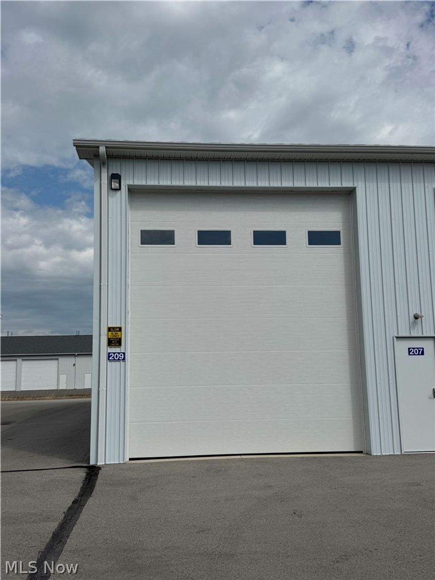 Located in the heart of Lake Erie Vacationland, this end-unit storage condo offers a premium storage solution just minutes from marinas, boat launches, and island access. This well-positioned unit is ideal for storing boats, golf carts, vehicles, or seasonal equipment. Featuring easy access and a secure environment, its close proximity to Lake Erie makes this a convenient and highly desirable location. Single unit includes laundry tub and plumbing for the toilet plus floor drain.