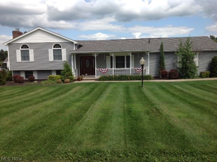 One owner spectacular custom built home on almost an acre. This spacious home features an amazing kitchen with corian counter-tops and newer appliances. Engineered hickory floors illuminate the kitchen, formal dining room and living room. Elegant master bedroom has vaulted ceilings, his & her closets and a master bath with his & her sinks! The exterior features professional landscaping, large deck and pool. Move in ready! Call today for a private showing.
