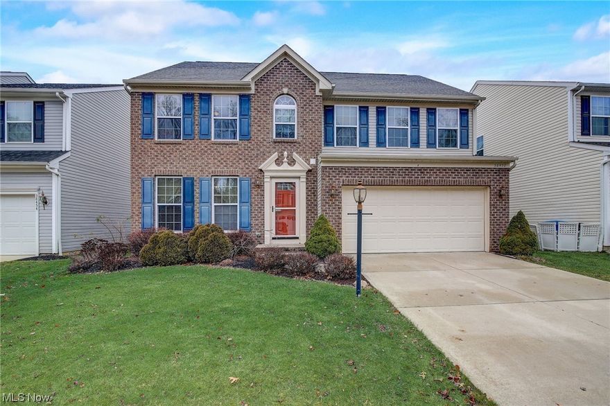 This inviting home in Stonebridge Creek, one of Avon's highly desirable communities, boasts an impressive exterior with a charming brick front and fantastic curb appeal. Nestled in a community featuring parks, fishing ponds, and a pool, this residence offers a delightful blend of comfort and recreation. Upon entering, the grand dining room welcomes you with its beautiful trey ceilings, setting the tone for the home's character. The main attraction is the stunning 2-story great/family room, highlighted by a floor-to-ceiling stone fireplace that adds warmth and elegance. The gourmet kitchen is a chef's dream, featuring a large center island, gas range, and plenty of cabinet and counter space highlighted by abundant natural light pouring in through the lovely windows. The well-thought-out floor plan includes a morning room off the kitchen, perfect for use as a sunroom or additional dining space. Conveniently located on the first floor is the laundry room equipped with a washer and dryer. Venturing to the upper level, you'll find a spacious primary suite that impresses with a glamour bath, separate shower, double sinks, and a huge closet. Two more generously sized bedrooms and a full bath complete the second floor, providing comfortable accommodations. The lower level of this home is a true highlight, offering an amazing finished space with a large family room area and an abundance of storage options. Out back you will find the gorgeous stone entertainment patio ready for you to host all of your friends and family! This property combines functionality, style, and a wealth of amenities, making it an ideal place to call home. Schedule your tour today!