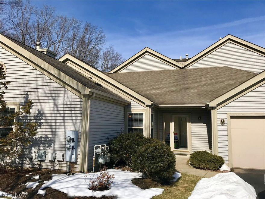 The setting for this Ranch Condominium is an exquisite position for privacy with the edge of the woods to be viewed from the Family Room, Office/Sun Room,
and Both Bedrooms.  A long elegant driveway with plenty of parking and a two car garage benefit the privacy too.  Walk into the Vaulted Foyer First then an added feature is the Mud Room from the 2 car garage.  Access to the Kitchen easily from the garage. Kitchen has an eating bar, pantry & plenty of downlighting.
Many windows keep this open floor plan light and bright.  Dining area opens to the 2 Story Vaulted Great Room that has a 3 sided gas fire place.  The Sun Room/Office has the other side of the fireplace and sliding glass doors to the Trex Deck.  Privacy on the deck with it's setting almost into the woods.  Skylights keep the rooms bright too.  From the Great Room there are double door entry into the Master Bedroom on Suite. Vaulted ceiling there too... Large walk in closet and an over sized walk in shower.  Skylite in the Bathrooms.  Walk in Closet.  2nd Bedroom is just as big, plenty of space to enjoy.  Full view storm door window on the Front door.  Alarm system. All appliances stay. All organic soil in the garden areas.  Access to Club House and inground pool for the entire development.