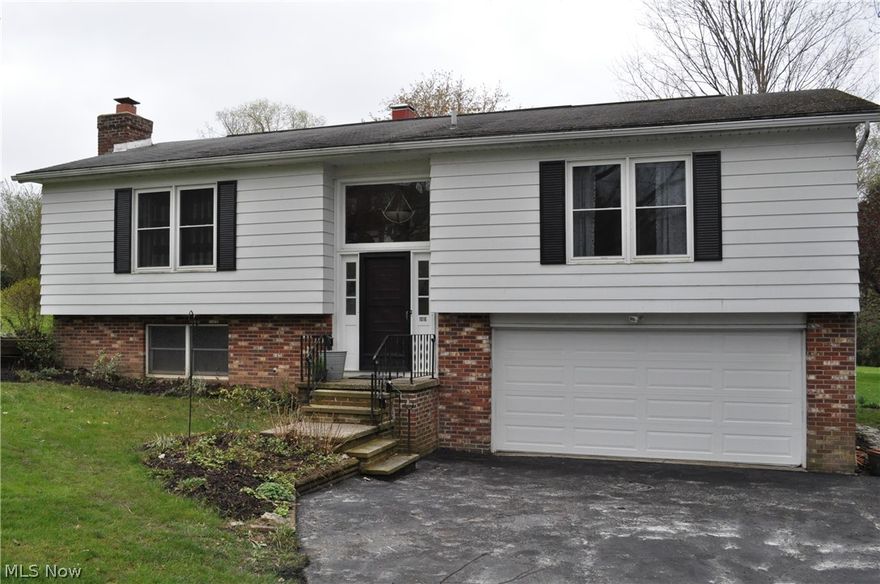 Don’t miss out on this updated, spacious home on over a half acre lot in a quiet neighborhood located near 480 and the Ohio Turnpike.  This unique 
bi-level/raised ranch sits on a deep lot that provides plenty of space for all of your outdoor needs.  Upon entering, the upstairs opens into a fully remodeled kitchen, dining and living space with an open concept.  The sun room boasts a large fireplace and exits onto an updated multi-level deck with a retractable awning overlooking the spacious backyard. To accommodate all of your summer nights, the deck exits onto a new paver patio that provides additional outdoor seating and easy access to the backyard.  The downstairs leads into a spacious family room complete with a second cozy fireplace.  Another full bathroom conveniently completes the finished space.  The lower level provides abundant shelving and storage for seasonal goods, and a cedar closet for clothing.  Schedule a private showing, or have us take you on a virtual tour.
