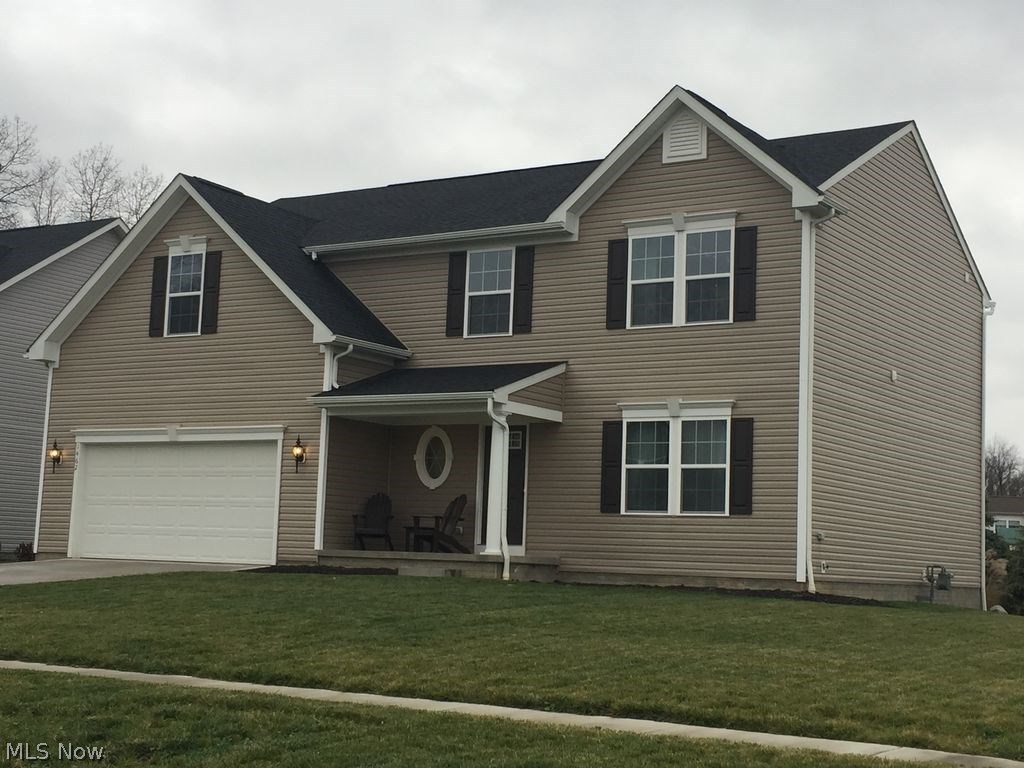 Brand new construction (2015) with premium upgrades throughout in desirable Tiberon Trace Development located within the Highland School District. Most items in the house are still under the original Builder's Warranty (as is the Landscaping). This is a spacious 5 bedroom, 2.5 bath colonial with 9' ceilings throughout lower level, hand scraped wood floors, a large fireplace in an expansive great room, first floor office, dining room, and kitchen with an island. Master suite includes large soaking tub and shower with his and her sinks and a huge walk in closet. The second floor boasts 4 other spacious bedrooms, a convenient 2nd floor laundry, a full bath with his and her sinks, and a utility closet for storage. Landscape was professionally done with 20k of exterior upgrades including stone steps and a large private patio that is surrounded by tasteful shrubs, flowers, and large privacy trees. The back yard opens to an expansive green space that backs up to the woods. This is a move-in r