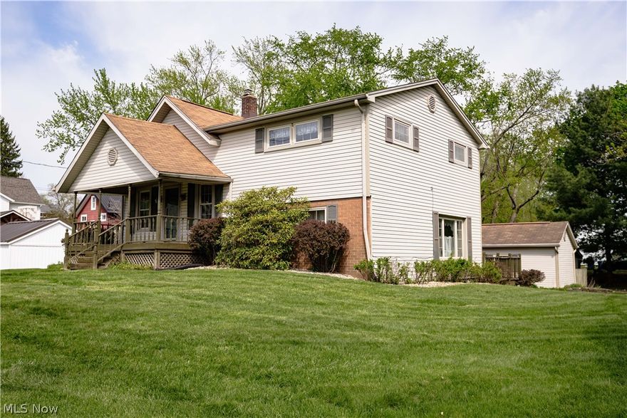 Enjoy this well kept, 2 or 3 bedroom, split level home sitting on a beautiful .39 acre lot in a great location on a dead end street in Hartville. The main level features a nice sized carpeted living room, a kitchen with vinyl flooring, a dining room, an updated full bathroom with a walk in shower and a large bonus room with many possibilities including a potential 3rd bedroom, a home office, a laundry room or a family room and this room has patio doors leading to a large deck overlooking the back yard that's perfect for entertaining family and friends. Upstairs has 2 ample sized bedrooms each with double closets. The lower level features a huge family/rec room with vinyl flooring and a door leading to a private deck. Other features include a 24 x 42 detached garage with electric that's great for storing and working on your "toys", a huge storage shed, an updated gas forced air furnace, A/C, a new water softener system, a relaxing covered front porch and more. A little cosmetic updating and TLC would go a long way and would make this a great investment in the Lake Local School District.