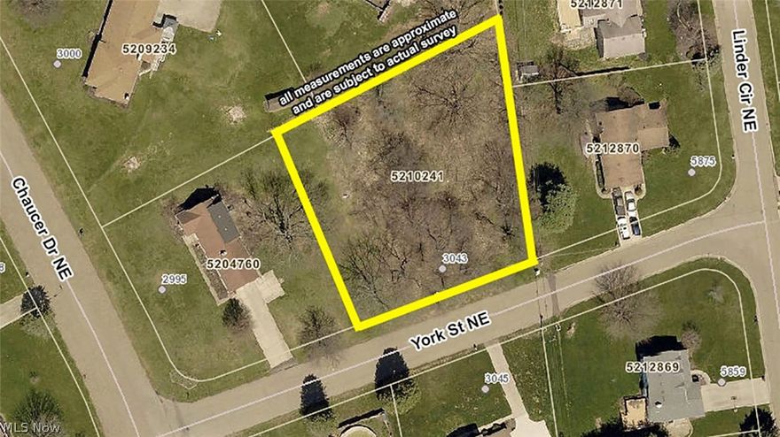 0.56-acre building lot in Sherwood Village - A nice level wooded lot - Walk at your convenience - Plain Local Schools