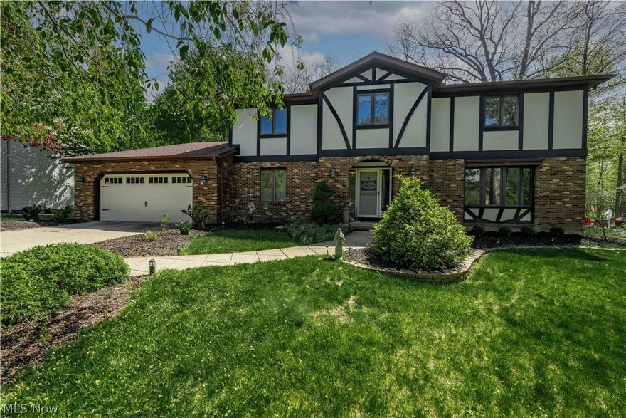 When you're here, you're home. Welcome to 8861 Edgewood where this 4-bedroom, 2.5-bath residence boasts an open floor plan that seamlessly integrates modern updates with timeless elegance. Step inside to find a beautifully updated kitchen featuring granite countertops that extend into a cozy eat-in area, perfect for morning coffee or quick meals. The kitchen flows effortlessly into the spacious living room, creating an inviting area for relaxation and social gatherings. Whether hosting a lively party or enjoying a quiet evening, the ambiance here is just perfect. Adjacent to the kitchen, the formal dining room awaits. Designed to host memorable dinner parties, it offers the ideal backdrop for both festive occasions and intimate dinners. Nearby, the family room serves as a great spot to unwind and engage in conversations, making every gathering special. Upstairs, the tranquility of the sleeping quarters awaits. Three large bedrooms provide ample space for family and guests, while the expansive owner’s suite offers a private retreat, complete with ample storage and a luxurious bath. The lower level of the home is partially finished, presenting a multitude of possibilities. Whether you envision a home theater, a workout room, or a play area, there’s plenty of space to realize your dreams, alongside extensive storage solutions. Step outside to discover a backyard that's a true escape from the everyday. With a large deck and generous yard, space is perfect for a garden or various outdoor activities. Situated in a friendly neighborhood, this home is not only a peaceful haven but also conveniently located. It’s ideal for those who work from home, need a quiet, dedicated office space, or for anyone who enjoys cozy winter evenings by the fireplace.