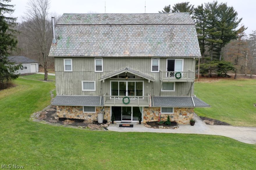 This beautifully converted & remodeled 19th century barn sits on 13.81 acres near Hinckley in the highly sought after Highland Schools district. The wooded property includes 2 homes-The first is 5 bedrooms 3.5 baths with 3 floors of living space and an additional walk up 4th floor available to renovate. Ground level features fantastic family room, bar, electric fireplace, half bath,/laundry room with washer and dryer & bonus room for storage or office space. Main level includes a living room with 2 story vaulted ceiling, dining room with wood burning stove, & fully applianced kitchen.The walk in pantry off the kitchen also has hook ups for optional 1st floor laundry. In addition to several decks and balconies on the home, you’ll have breathtaking views from every room! A hand crafted spiral staircase leads to the 3rd floor where you will enjoy the spacious master bedroom w/ large full bath with walk in closet & loft overlooking the 2nd floor. You can enjoy the outdoors with a large ope