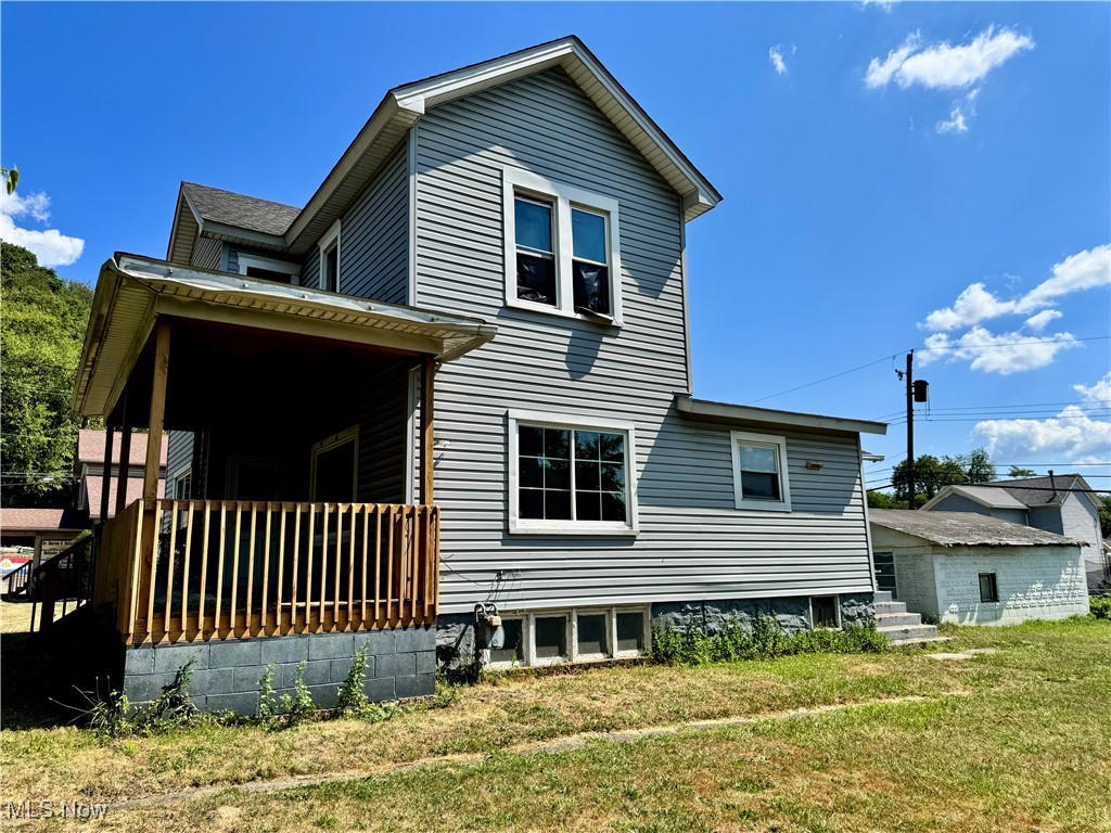 Investor Alert! Welcome to 1090 Pennsylvania Avenue - a 3-bedroom, 1-bath home including two city lots in East Liverpool. This home offers excellent potential for rehab or rental income. The property includes a spacious 2-car detached garage. The interior needs TLC, making it a perfect opportunity for cash buyers or investors looking to add value through renovation. Situated in a convenient location, this property is ideal for a flip or long-term rental. Cash buyers only—schedule your showing today and capitalize on this value-add opportunity!