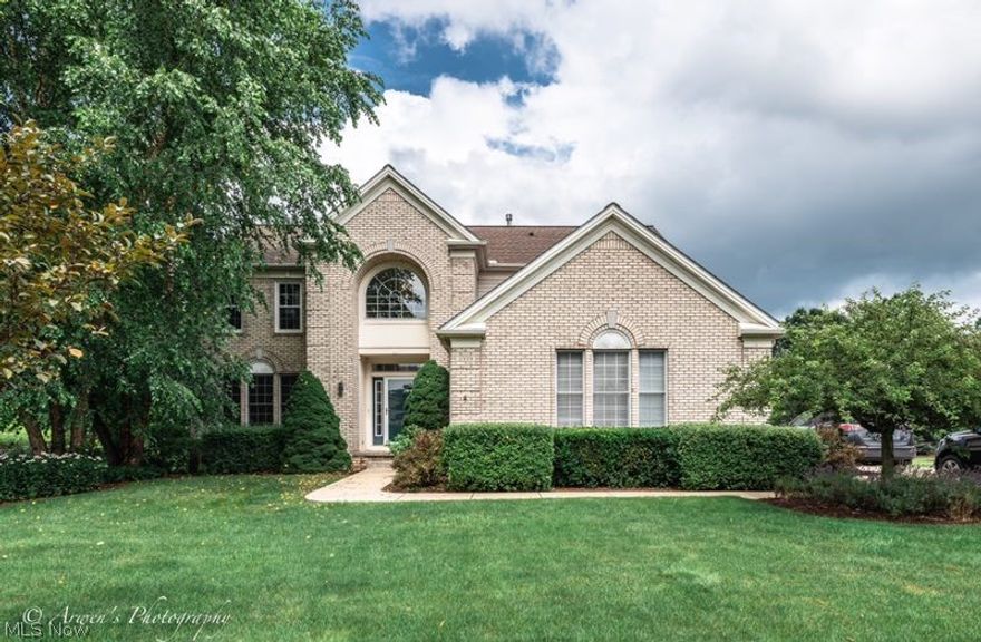 A lovely brick front transitional colonial backing up to the golf course with great views. Two story foyer with the elegant crystal chandelier & newer hardwood flooring. The spacious kitchen includes an abundance of cabinets, a center island, and updated with granite counter tops/all newer appliances, an eating area with the patio door to the two level deck and beautiful backyard. The inviting family room featuring a fireplace and wood laminate flooring/decorative shelves. The first floor laundry with newer flooring. Master suite featuring a volume ceiling, large walk in closet, glamour bathroom with whirlpool bath and separate shower. The other bedrooms are generous in size. Most of lighting, carpets on the 2nd floor and all toilets have been replaced. The finished basement with a rec room, office area and a full bath. Roof 2011, newer windows in FR and bedrooms. All appliances stay. Great neighborhood!
