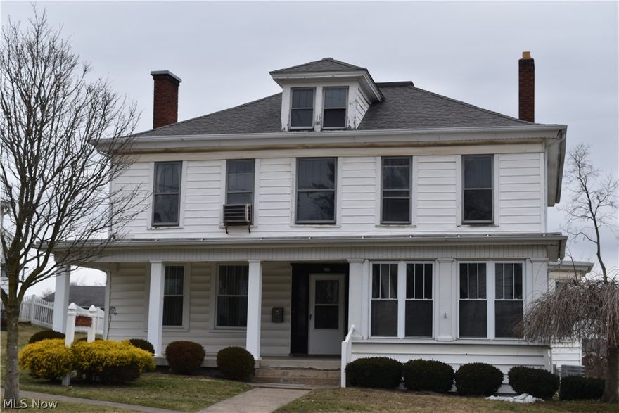 Location, Location, Location. This great commercial building is located on the highly traveled Main St in St. Clairsville. There is plenty of off street parking with it's own private driveway plus on street parking if needed. Have your business on the first floor with offices and 1.5 baths and have income coming in from the upstairs that has 2 rental apartments. Property is currently vacant, but in the past has rented for commercial space $1200 a month and the upstairs units for $350 each with the tenants living there for a long amount of years and owners never raising the rent.