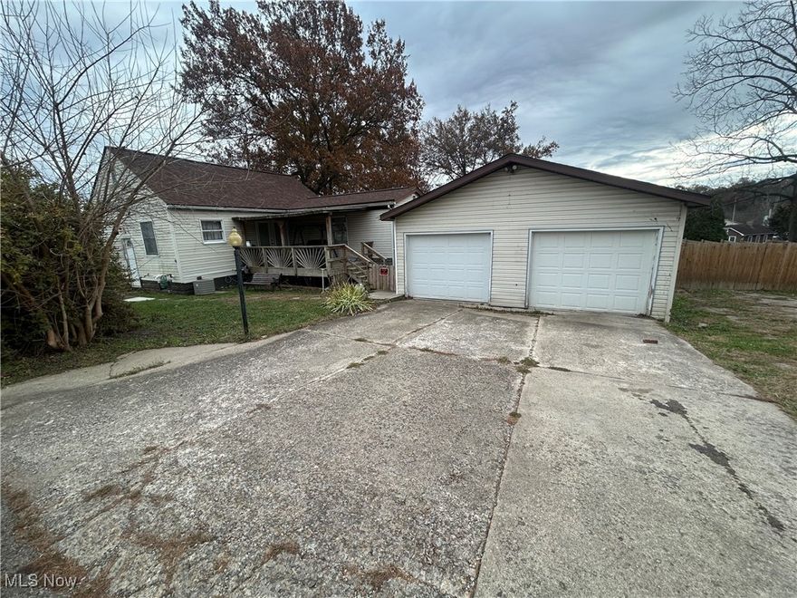2 bedrooms, first floor Laundry, updated baithroom, fenced in Yard, 2 car garage.large kitchen ,