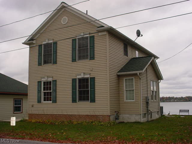 Wow! 2006 built Springfield Lake front property! Open kitchen/living room/dining! First floor master with walk in closet as well as 2nd floor master with walk in closet! Dock, owns out into water! Slider to deck on first floor as well as slider to deck on 2nd floor! Concrete crawl space, about 4' high, great for storage! 1st floor laundry! 2nd floor has 2 bedrooms, full bath and open study that overlooks lake! 2 car detached garage!
