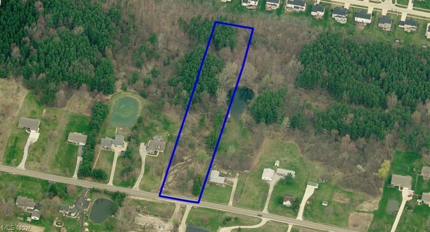 Just under 3 acres of Wooded Land in Montville Township with a swale in the front! Minutes from the Historic Medina Square, this lot is the perfect slice of Township Living for building your future home! Medina City Schools.