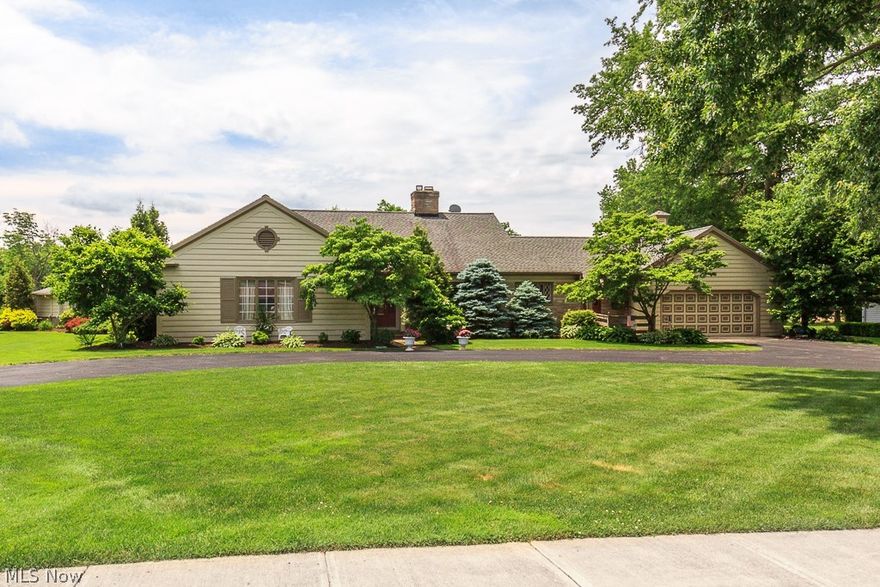 Beautiful Mid-century modern 4000 + sq ft home. Entering through the front door are large spaces of first floor living with an open floor plan & sprawling layout. Fabulous for entertaining for every holiday! The newly renovated eat in kitchen offers up to date decor including stainless steel appliances, wolf stove and honed granite. The formal dining room has a wood and charcoal burning grill and fireplace with gas starter, a wall of built-ins, and window views of the entire backyard. The Great Room was built with gorgeous beamed vaulted ceilings, top of the line Vermont casting wood stove for additional heating, newer plush carpet and wet bar with subzero refrigerator and ice maker. Do you have a green thumb? Enjoy the 17X14 temperature controlled Lord and Burnan Green House equipped with a newer 95% efficiency furnace, cooling fan and full draining floor. The spacious Master Bedroom with on-suite has built in dressers with his and her closets. The 2 additional bedrooms, cedar closet