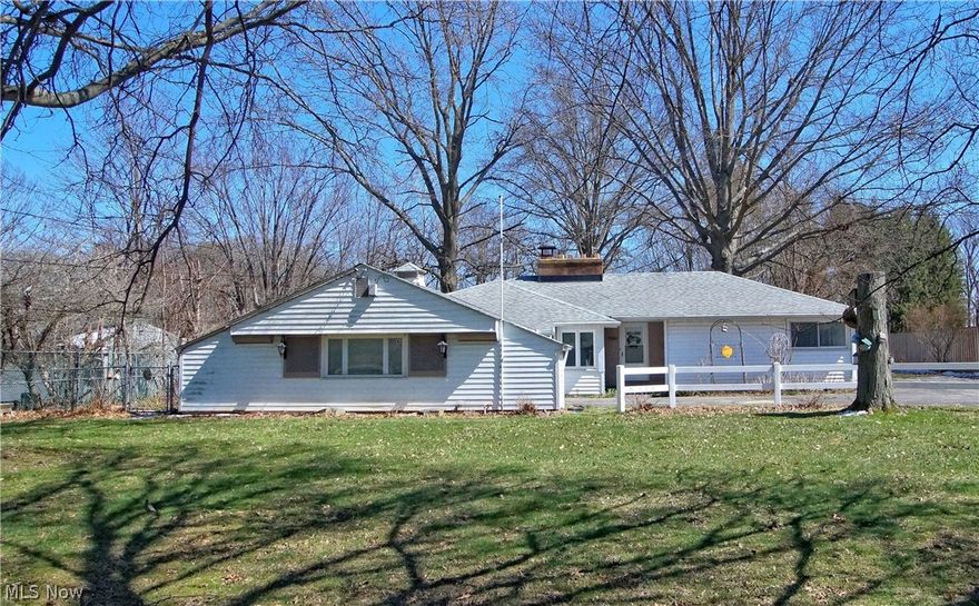 Super potential * Your decorating ideas will go a LONG way * Ranch home with great curb appeal * Desired neighborhood * 1 ACRE – a rare find in the suburbs * Lots of natural light throughout * Eat-In-Kitchen with maple cabinets & solid surface countertops * 2 Nicely sized Bedrooms with plenty of closet space * 2 Full Baths, one with a walk-in shower * Large Living Area with stone gas fireplace (currently not operational) and 3 big picture windows with beautiful views of the supersized back yard * Enclosed Porch * Covered Patio next to garden area – could be a really great patio area if expanded *  2 large sheds for extra storage * Deep attached 2 car garage * Seller is providing a Cinch home warranty for Buyers added peace of mind * Aggressively priced to Make this house YOUR HOME!