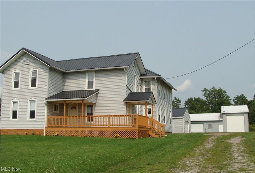 Country living, yet only minutes from town. Make this newly remodeled century home your BUSINESS, MINI-FARM or place for large gatherings and storing all the collectibles, motor home or semi tractor in the 60ft x 40ft pole barn. The barn has one bay door 14ft high, 220amp service, wired for extra lighting and outlets. The additional two-car garage has extra space in the rear for motorcycles, lawn mowers or man-cave. Also a 220amp service box. The home has newer windows and metal roof. Bedrooms have new carpet other rooms have new hardwood flooring. Kitchen and bathrooms have ceramic tile floors. First floor laundry and bathroom. A new boiler heat system has been installed, hot water tank, breaker box, pex plumbing, well pump and water treatment system but won't be needed for long as RLCWA is bringing rural water down this road very soon. Water tap being purchased. Enjoy the picturesque views from the front porch with quiet sunsets. Sold As-Is. Pre-approved buyers only.
