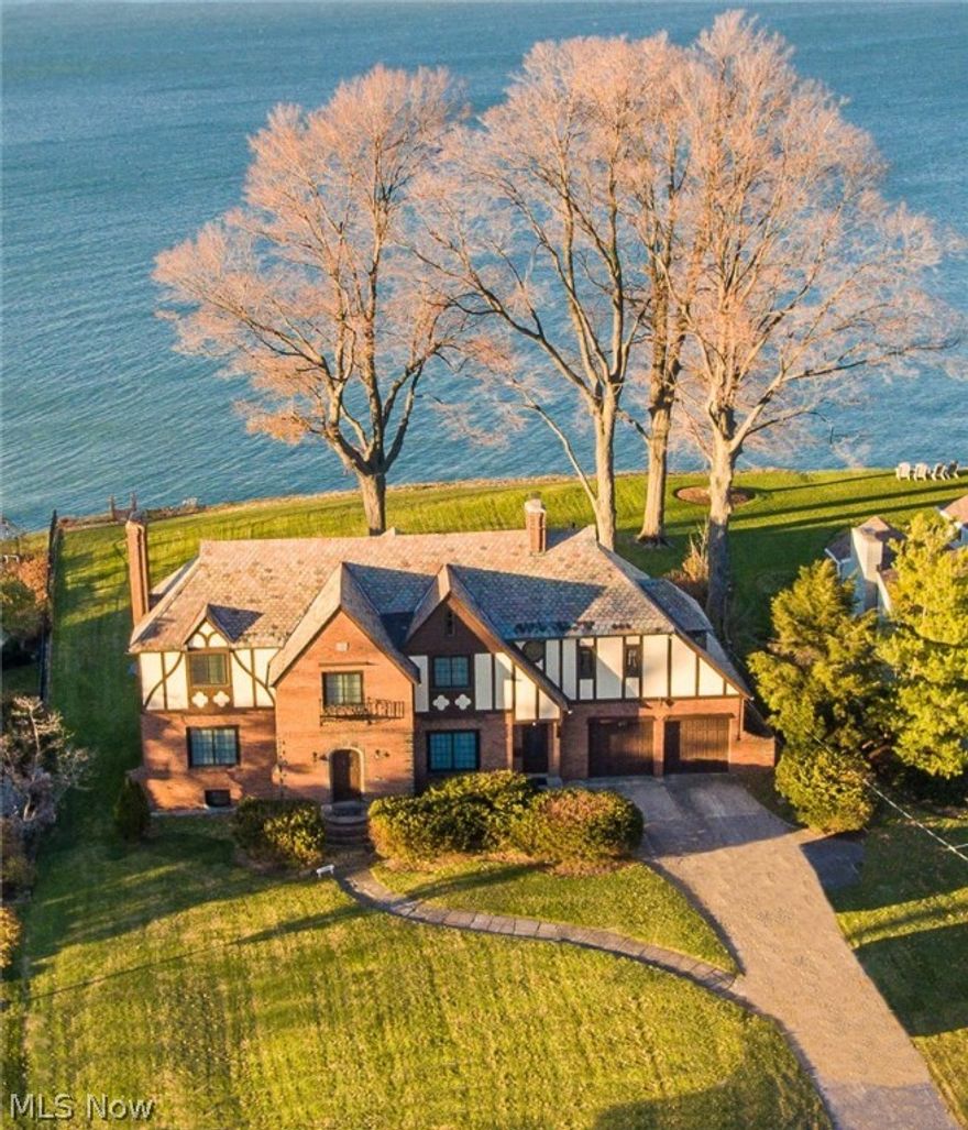 Welcome to 20178 Parkside.  Never before on the market, this is a once in a lifetime opportunity to own one of the most desirable pieces of lakefront property in Rocky River.  The majestic home features 6 bedrooms along with four full and one half bath.  Beautiful wood floors highlight the home's first floor, and are tucked under carpet on the second.  Two wood burning fireplaces enhance the home's character, and the three season room is an excellent place to enjoy the views. The kitchen features a charming breakfast nook, both of which are ready for your design ideas.  All of the bedrooms are on the second floor, two accessed by a separate staircase.  The master features a decorative fireplace and an impressive walk out porch. A walk up attic is the perfect place for expansion or for the kids to play. Just steps from Rocky River park, this home sits of over a half an acre of land with spectacular views in both directions.  Over $100K in break wall work has been completed by the owner