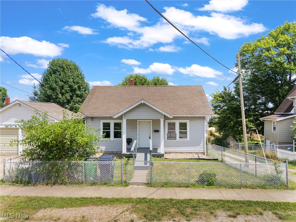 Welcome to this charming and well-maintained 1-bedroom, 1-bathroom home in the heart of Rittman—perfect for first-time buyers, those looking to downsize, or investors seeking a cozy, character-filled property. Step inside and be greeted by the warmth of original woodwork, beautifully preserved built-ins, and vintage hardware that add timeless charm throughout. The bright and open living area is filled with natural light and features stunning solid wood double doors that lead into the formal dining or additional living space—an elegant nod to the home's classic craftsmanship. The kitchen offers ample cabinet space and a functional layout, with a convenient main floor laundry room just off the kitchen for easy everyday living. The spacious bedroom easily accommodates a full furniture set and includes a generous closet. The updated full bathroom boasts a clean, classic design that blends modern touches with enduring style. Enjoy the practicality of off-street parking and the comfort of living just minutes from local shops, schools, and parks. With its unique character and thoughtful features, this home is a true gem. Don’t miss your opportunity to own this character-rich home—schedule your showing today!