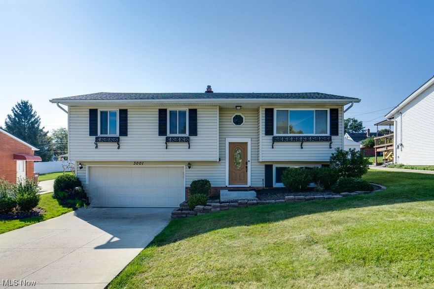 This tastefully updated, immaculately maintained home is ready for its new owner!! Step up into the main living area and enjoy the fresh, modern paint tones that coordinate with the updated vinyl flooring throughout. The stunning kitchen - featuring granite counter tops, new stainless steel appliances (2021), and soft close cabinets - immediately invites you inside. Continue in through the living space which flows into the dining area that is situated in front of large sliding doors that provide a gorgeous view overlooking the deck and backyard. The remainder of this upper level layout is completed with three bedrooms and a full bathroom. Downstairs find additional, tastefully finished living space complete with a half bathroom. The laundry room, with a new washer & dryer (2021), and additional storage can be found on the lower level as well. The beautifully updated and maintained yard is just under a quarter of an acre, has been fully fenced in with a new privacy fence (2022), and is ready for all entertainment/pet-friendly needs!