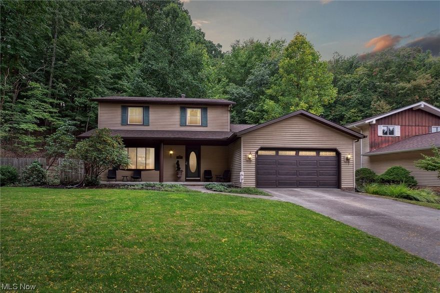 Welcome to your very own private oasis! This well cared for home offers over 2000 square feet of living space, and is located at end of the street nestled at the forest's edge. Not only does the home offer a beautiful and serene setting, but it also has all the updates and upgrades you are looking for. As you step inside, you are impressed with the high end upgrades and attention to detail. The living room features gleaming hardwood floors, wainscoting and crown molding that carry through to the dining room. The kitchen was recently remodeled and is a true gem with its high quality cabinetry, granite counters, tile backsplash and SS appliances. Enjoy the view of your tranquil backyard from the family room which offers a wood-burning stove with rose granite, newer carpet and sliding glass doors out to your multi-tiered deck. An updated half-bath and laundry room finish off the 1st floor. On the 2nd floor, you will find your spacious master that features vaulted ceilings, an updated bath with tile shower and tub, and a new closet system. 2 more nicely sized bedrooms and a full bathroom with walk-in tile shower finish off the 2nd floor. You will love the extra space in the finished basement, but there is also plenty of room for storage. The backyard is truly a nature lover’s dream. You can enjoy the shade of the trees and the privacy of the forest edge lot from the large deck. Don’t miss your opportunity to own this private and tranquil home. Schedule a showing today!