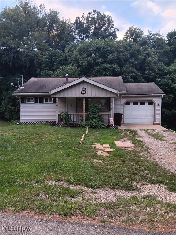 This affordable 1 story home features 2BR's, Attached Garage, & Walk-Out Basement on 0.3 acres. Enter into the home from the attached garage for convenience, or invite over guests to sit on the updated concrete front porch to relax. Inside you will find hardwood floors in the Living Rm & Both Bedrooms. The 1st floor BA has been updated & Kitchen provides plenty of storage & leads to the Walk-Out Basement. An optional Bonus Rm & ample space in the utility room w/ Laundry are located in the basement. From the lower level, walk out to your private back yard area or garden in the large side yard. Conveniently located just minutes from interstate & many amenities! Call today for your showing!