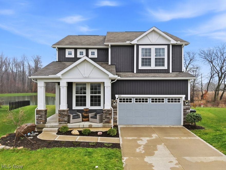 Buyers make sure this must-see home doesn’t pass you by! Located on one of the premier lots in Blooming Acres and nestled perfectly on a quiet cul-de-sac with serene water views, this beautifully designed Boardwalk model home offers modern comfort, flexible living space, and peaceful surroundings. Greet guests in your front foyer with inviting views of the open floor plan that boast a vaulted ceiling, recessed lighting and a bright and welcoming layout. The kitchen is highlighted with an island breakfast bar, pantry closet, workstation area, and dining room with easy access to back deck making daily food prep or entertaining a pleasure. Adjacent to the kitchen, the garage entry/mudroom provides everyday convenience with its built-in boot bench and spacious coat closet. The first floor also includes a large half bath and family room with potential to convert into a first-floor bedroom or in-law suite.  Upstairs, a spacious loft/family room with a built-in entertainment stand and fireplace adds extra living space. The second-floor laundry is centrally located, while the master bedroom provides an en-suite bathroom w/ double sinks, separate tub and shower, and a generous walk-in closet. Three additional bedrooms and a full hall bath complete the upper level. The finished lower level adds approximately 960 sq ft of additional separate living space, including a full bedroom, full bathroom, two large, open family rooms, and a utility storage closet. Outdoor living is a pleasure on your new 16×14 Trex deck. With no rear neighbors and open farmland behind the property, you’ll enjoy privacy along with tranquil nature and water views. Lot size measures just under a quarter acre, offering extra space without heavy maintenance. The community provides shared green space, ponds, a playground, pavilion and basketball courts. Located in the Highland School District, this home is ready to welcome its next owner. Unique opportunities like this don’t last, schedule your showing today!