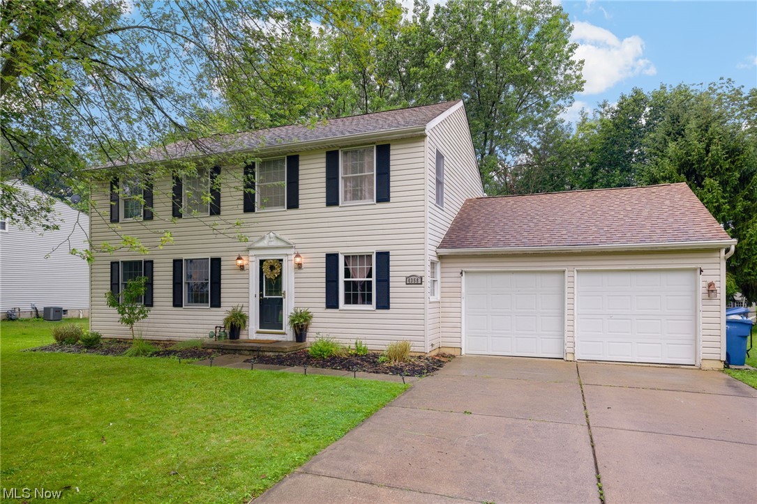 Welcome to this stunning four bedroom, three bathroom colonial in the heart of Green! With its convenient location close to schools, parks, restaurants, shopping, and 77, you'll have everything you need within reach. As you step inside, you'll immediately notice the many upgrades that have been made throughout the home. The spacious living areas on the first floor are perfect for entertaining friends and family or simply enjoying a quiet evening at home. The updated flooring adds a touch of elegance, while the freshly painted walls provide a clean and modern look. Whether you're preparing a gourmet meal or simply grabbing a quick bite, this kitchen will not disappoint. The huge master suite offers a large closet, private full bathroom, and a make-up area. Throughout the house, you'll find updated light fixtures that add a stylish touch to each room. The whitewashed fireplace creates an inviting ambiance, perfect for cozy evenings. The exterior of the property has also seen significant
