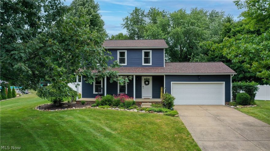 Gorgeous 3-bedroom, 2 bath home in Jackson Twp. in Massillon. This home is move in ready and so beautifully updated! It features hardwood floors in the main living areas with the kitchen and hallway floors installed in 2018. The kitchen is fully renovated (2018) with deep navy cabinets, subway tile backsplash, a breakfast bar, butcher block counters, and stainless steel appliances (all appliances including washer and dryer are newer with purchase dates available in the supplements). The living room has stunning built in bookcases. The family room has a gas fireplace (2021) and sliding doors to the concrete patio (2018) in the amazing back yard that is fully fenced and features garden beds and a shed. The exterior of this home is totally renovated as well with new siding, gutters, and vinyl privacy fence (2022) as well as new windows and roof (2020).
Three bedrooms upstairs with a gorgeous full bath that is completely renovated (2018) and features a dual vanity and marble tile.The half bath on the main floor is new as of 2024. This home has a heat exchanger Trane furnace (2015), new capacitor for the HVAC (2021), new fan for radon mitigation system (2022), and new garage door opener (2022). With a partially finished basement, what else could you ask for?! No detail has been overlooked in this well cared for home. Schedule your showing today. This one will not last long.