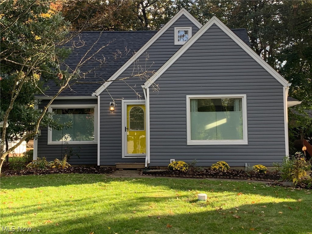 Welcome home to this beautifully updated, move in ready Cape with room to grow in the charming coveted West Akron community of Castle Park. Located just a short walk from Stan Hywet Hall and close to shopping, restaurants & parks, there is plenty of activity to be enjoyed year-round! The first floor boasts plenty of living space, & an abundance of natural light! Beautiful wood flooring flows through the open floor plan & into the living room where you'll find the cozy fireplace & relaxing atmosphere. The second story offers the spacious Master Bedroom with walk in closets and plenty of room to easily ad a Master Bath en-suite. The basement has been partially finished for recreation including a second fireplace for those chilly fall nights. The lover level boasts a great workshop space as well as additional storage & shelving. The private backyard is definitely a bonus. Other home improvements include: brand new roof, new siding, new gutters (10/2020), new windows with exception of a f