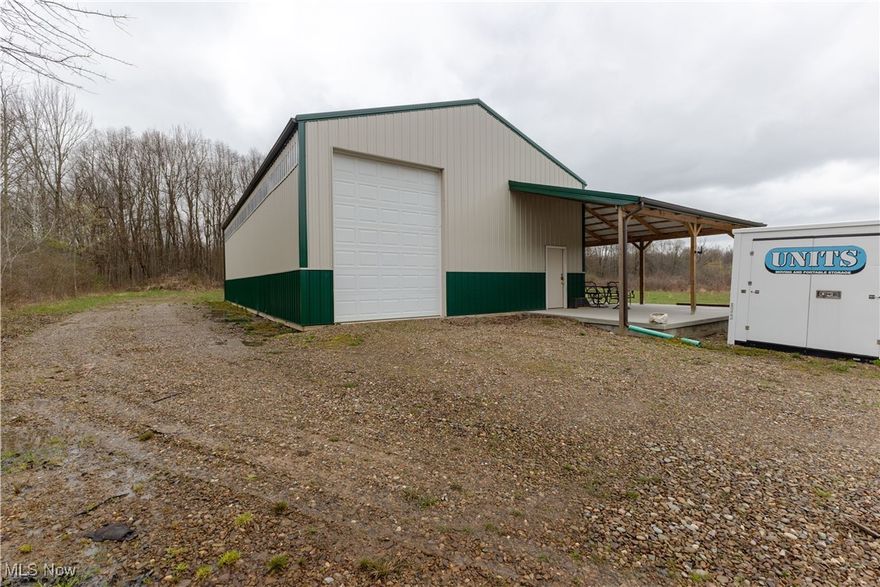 11.55 Acres with New Pole Building, RV Hookups & Pond – A Rare Find!  Don’t miss this incredible opportunity to own 11.55 acres of versatile land featuring a 32x60 pole building built in 2022 with a concrete floor and spacious covered patio—perfect for storage, hobbies, or future living space.  It even comes with a pool table! The property includes two RV hookups, and the seller has already brought electric to the site. Public water and gas are available at the street, and a soil test has been completed, saving you time and money in your building plans.  The land is a beautiful mix of open space and woods, ideal for recreation or building your dream home. A pond is tucked toward the rear of the property.  Whether you’re looking for a private retreat, homestead, or a place to start your next adventure—this one has it all!  The groundwork is already done—bring your vision and make it yours!