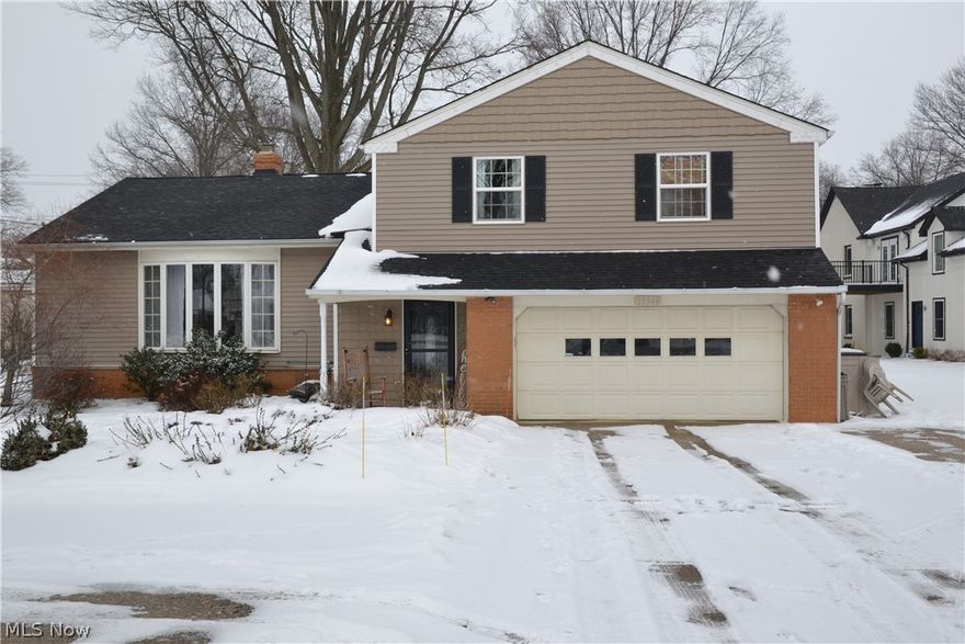 Welcome home to 33346 Electric Blvd! This beautiful split level is located in the desirable community of Avon Lake, just a short walk to Lake Erie and Miller Road Park. This home is not your average split level, boasting 4 bedrooms, 2.5 baths, an open concept floor plan, fireplace and – wait for it - a basement for all your storage needs! The moment you walk through the front door, you will be amazed at the openness and the natural light pouring in from the newer windows. Up the stairs to your left is a spacious living room featuring a beautiful bay window. The living room flows nicely to the dining room and large kitchen - the perfect place for entertaining. The kitchen, featuring an over-sized island and breakfast bar, overlooks the family room below. The family room has a newer glass sliding door and a fireplace, making this room a cozy place to relax. Upstairs, you will find four bedrooms, each with hardwood floors. The master bedroom has an ensuite bath. Many of the ‘big-ticket’ i