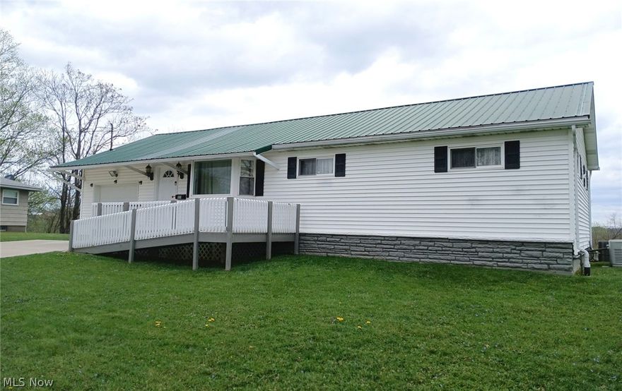 Very nice, traditional ranch in a semi-rural area. Great living space that includes a family room, 3 bedrooms, 1 bath and a spacious living room. At the back of the house is a large covered deck that has a spectacular view overlooking the hills of West Virginia. Easy maintenance and upkeep. Genera whole house generator.

There is a Ring security system on the property securing all doors and windows. (Does not convey).