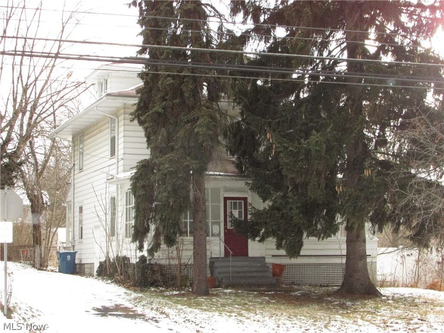 NOT BANK OWNED...Home needs some work, but has had updating done.  The kitchen has been updated.  Rooms are large, with a fenced yard, 2 car garage, enclosed front porch, full basement, and more.
