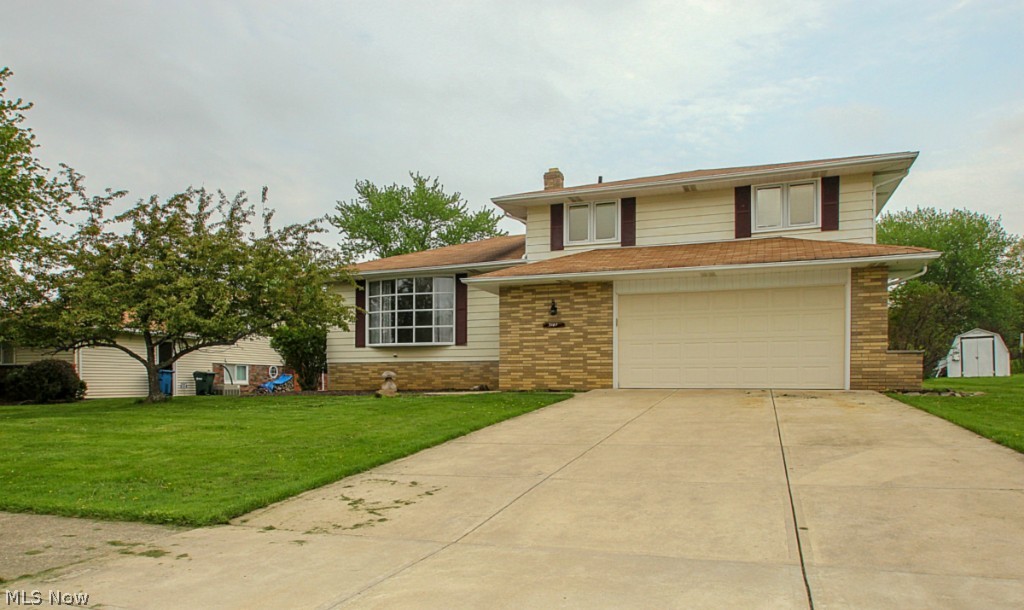 Updated & Spacious Southeast Parma Split level located in the desirable neighborhood of Gettysburg Estates. This home has the updates that that are found all to infrequently in the market today. The Kitchen has been completely remodeled from the Hand Scraped Hickory Engineered floor to ceiling, including Plumbing, Electrical, recessed and Under Cabinet Lighting, New Quality Cabinets & Appliances, Glass Tile Back Splash and Granite Countertops. The Baths have been Completely updated with Porcelain and Ceramic tile flooring and all new lighting and plumbing fixtures. New Hot Water Tank in 2014 Hardwood flooring in bedrooms in great shape Freshly painted with neutral tones and nice use of color. Just installed New Carpet in Living room, Family Room and Rec Room. Deck off of Family room overlooking back yard and outdoor fireplace has been recently stained.