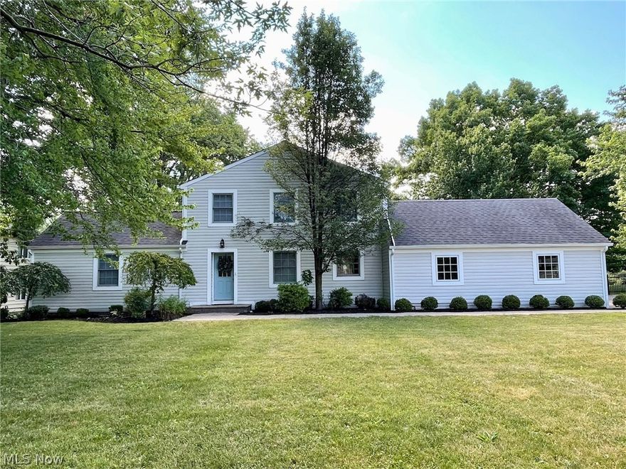 Welcome to this hidden gem that is packed with upgrades and boasts captivating views! Two sets of French doors open onto an expansive deck overlooking a lush, wooded acre that feels like your own private nature preserve! Solid teak floors, newly refinished oak floors in all four bedrooms, and natural stone flooring is featured in all four bathrooms. The stunning kitchen boasts Kraft maid cabinetry, new light fixtures, brand new Kitchen Aid appliances, granite countertops and travertine subway tile. The master suite features a walk-in closet and spa-like bathroom with granite, built-in storage and glass-enclosed shower. Lower level has been upgraded with gorgeous hickory floors and features recessed lighting and neutral paint, perfect for a rec room, playroom or home office. Fully fenced!