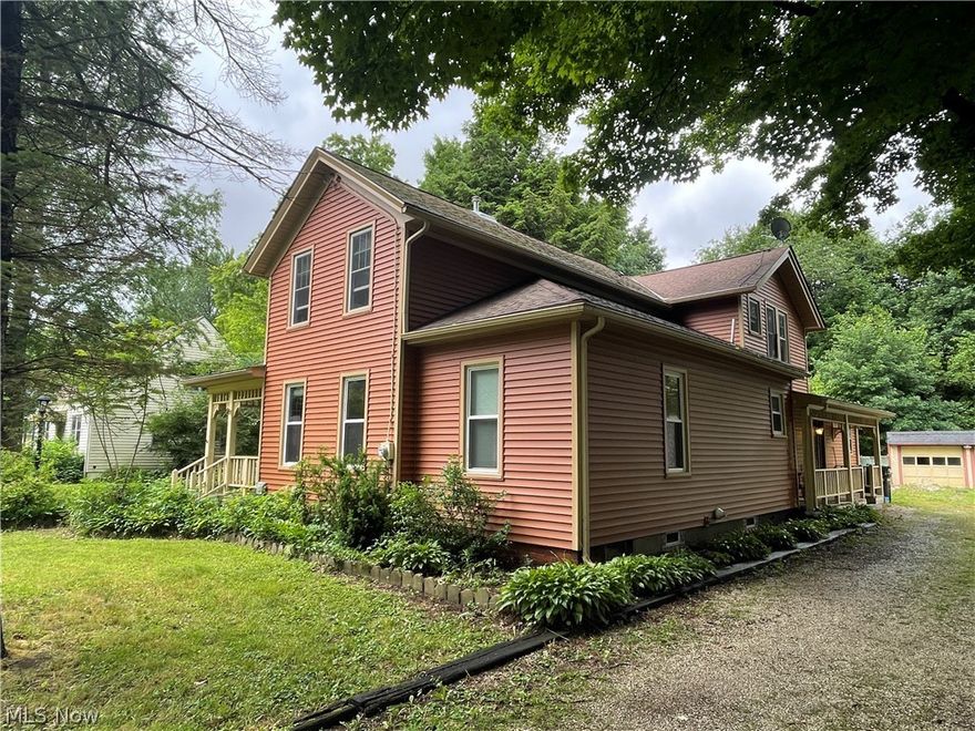 Love the old charm, this house is an amazing home with 4 bedrooms, the master bedroom on the first floor with a 12x17 attached bathroom.  4 porches to choose from to sit and have your morning coffee 3 of them are covered. Great fenced in yard for the kids or animals.  Large formal dining room with amazing woodwork molding.   Beautiful front entrance way that leads to the living room with hardwood floors.  Updated roof, windows, furnace, air conditioning, kitchen.   Large mud room with seating.  Back patio overlooks the beautiful backyard with a coy pond.  Home was once divided into a duplex.