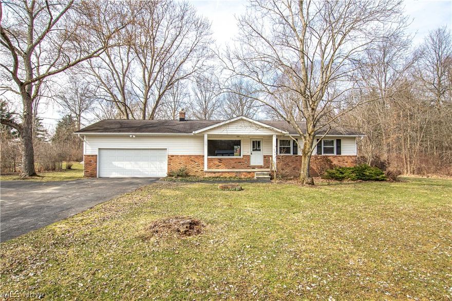 This spacious ranch home is the perfect find for first time buyers or anyone looking to add their own personal touches on their new home! Sitting on a large, nearly one acre lot, the home offers plenty of space inside and out to truly make it your own! Step inside to find a bright living room, flooded with natural light from the front picture window and featuring beautiful blonde hardwood floors. The hardwood floors continue through to the formal dining room with large sliding glass doors on to a huge backyard and into all 3 bedrooms. The dining room shares a half-wall with the spacious kitchen. You'll love the kitchen for its wrap-around oak cabinets and pantry that offer tons of storage, plus all appliances are included and there's even room for a cozy breakfast nook! Additionally, there are 2 full bathrooms and a full basement with tons of space for laundry, a work area, storage and more! The home also has a large attached 2-car garage that offers even more space! The deep yard pres