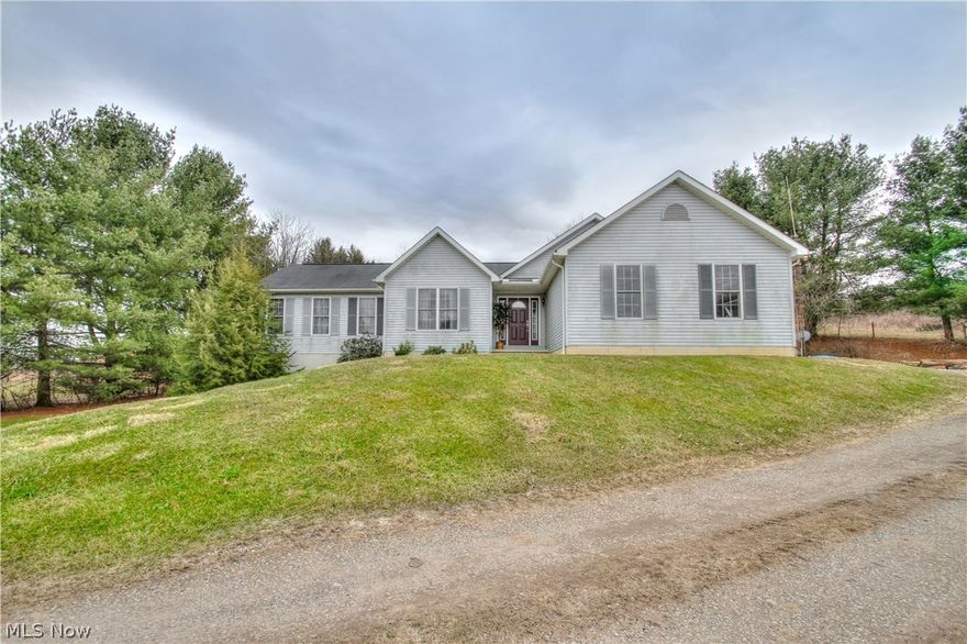 Wonderful ranch home on 20 acres with open floor plan built by Schumacher homes in 2007! Great room, sun room, dining room and kitchen are all open to each other. Kitchen has tile floor, bar seating for 6+, Corian countertops, tons of cabinet and counter space, over the range microwave and dishwasher. Great room with fireplace and vaulted ceiling. Spacious dining room and bright sun room with access to deck. Master suite with private bath offering double sinks, walk in closet, corner jetted tub and shower. A perfect retreat. Bedroom 2 has a large closet. 1st floor office could easily be converted into 3rd bedroom. 1st floor laundry room too. Full, walkout lower level ready to be finished to your specifications. 2 car side load garage, separate 1 car garage plus workshop and barn with pasture. Exterior wood burner for whole house heat too!