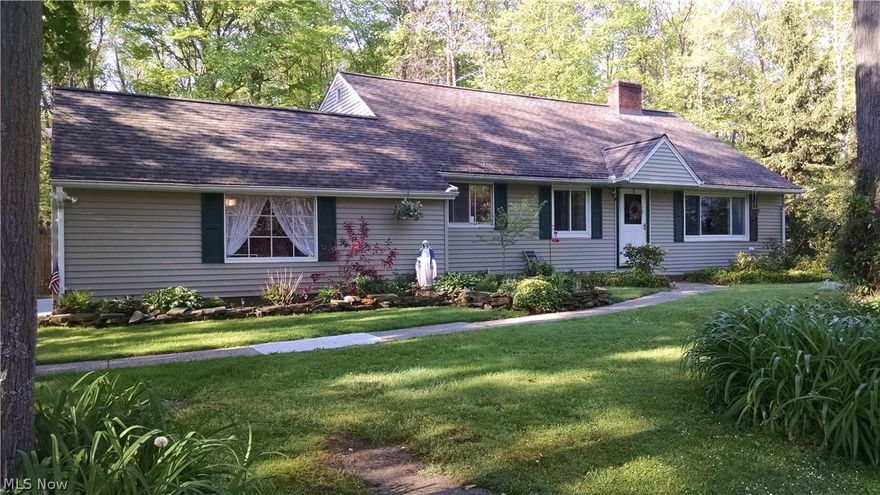 Gorgeous Three Bedroom, 1-1/2 Bath Split, Updated and Ready for You to Move Right In! Amazing Landscaping - Your Own Private Oasis! Vaulted Living Room and Dinette with a Wood Burning Fireplace .  Views of the Beautiful Yard! The Family Room Features a Wood Burning Fireplace. Upstairs are 3 Updated Bedrooms with Carpeting, a Stunning Full Bath Has Been Remodeled Just Gorgeous! All This Plus a 2-Car Attached Garage,  Half Bath, Laundry/Utility with Washer & Dryer, Back Yard Shed! New septic in 2016, Furnace and A/C 2010, Hot water tank 2015, garage floor & door 2016 .Look Quickly as this Home Will Not Last Long!