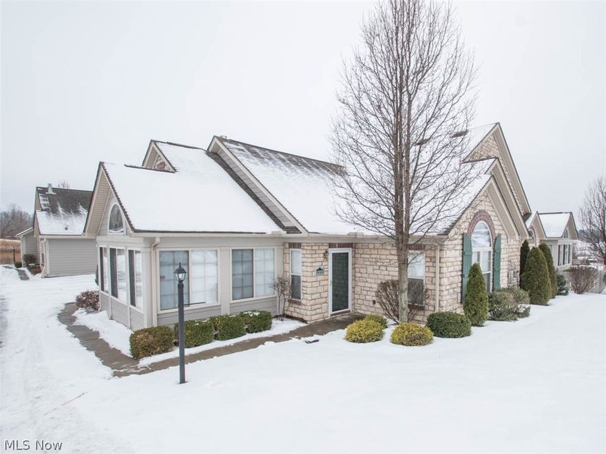 A Notch Above the Rest! This beautiful and meticulously kept condo in Springfield Local Schools has it all. The open floor plan gives you all the space you crave.  Large rooms including 2 bedrooms and 2 full bathrooms. Spend cold evenings in front of the fireplace in the living room with cathedral ceilings. Enjoy the natural light anytime of year in the alluring sun room. Convenient 2 car attached garage and plenty of storage space throughout. Painting not your thing? No problem! Everything has been freshly painted, all new carpet, and the furnace has been upgraded. Water heater and appliances only a year old. All of this and access to the Club House and the in-ground swimming pool. This condo is ready and waiting for you.