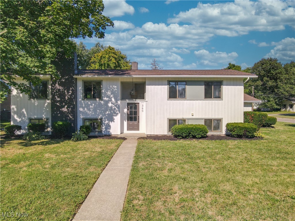 Welcome home to 360 Marviel Dr. Fairlawn OH 44333. Home shoppers, stop your search because this home just might have everything you have been dreaming of and more! Centrally located in Fairlawn, Ohio, sits this bi-level fully remodeled and updated 4 bedroom home. 15 ft vaulted ceilings, an abundance of natural light, open floor plan, and plenty of space for the whole family are just some of the many special features this home has to offer. Live and host in both comfort and style with the fully updated kitchen complete with luxury quartz counter tops, new cabinetry, new appliances, and ability to entertain both inside and outside. This home offers main floor living as well! Down the hall from the main living area is the master suite featuring a custom wood accent wall, a luxurious ensuite bathroom and your own private walk out 4 seasons room. Two additional bedrooms and a full bathroom finish off the main level. Continue your living and entertaining In the fully finished and updated lower level featuring an oversized family and rec room. Cozy up around the fireplace that features a custom wood detail surround. Down the hall is a third full bathroom and a fourth bedroom. Lastly, the brand new large mudroom / laundry room combo is right off the walk-out door that leads back up to the garage. Before ending your tour, take a walk around the property and envision yourself hanging out on the deck or patio while the kids and pets play in the yard. Close to Copley-Fairlawn Schools, highway access, restaurants, shopping, entertaining, and more, this home has everything you’ve been looking for! Come take the tour in person today and make 360 Marviel Dr. Fairlawn OH you’re next home.