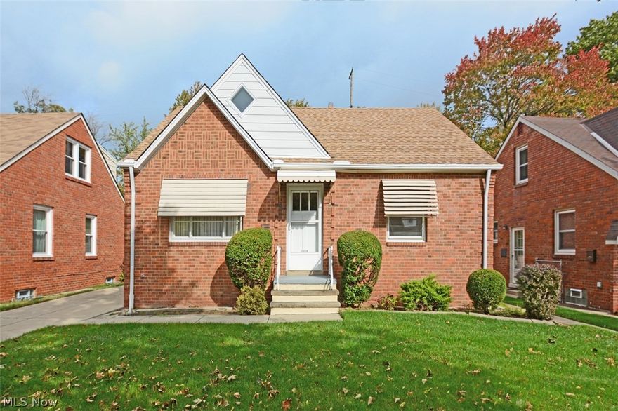 Impeccably maintained brick bungalow in desirable West Park across from Warren Village Shopping Center.  First floor offers a light and bright eat-in kitchen, living room, 2 bedrooms with hardwood floors exposed and a full bath.  Upstairs you will find a large 3rd bedroom and additional bonus area that could be used as a study or home office.  Lower level is partially finished with paneled walls and checkerboard tile, a full bath, separate laundry area and utility area. Outside is a large detached 2+ garage that offers lots of additional storage space, rear patio, and gardens.  Backyard opens to greenspace. No rear neighbors.  Updates include:  Electrical Panel (2017), Hot Water Tank (2013), Driveway w/ drain and front sidewalk (2006), Roof replacement with tear off (2005), Basement full bath added (2002), Garage roof replaced (2000). Furnace/AC (1989).  Close to shopping, schools and freeways.  Incredible storage throughout and great retro vibe.  Make this a must see on your list befo