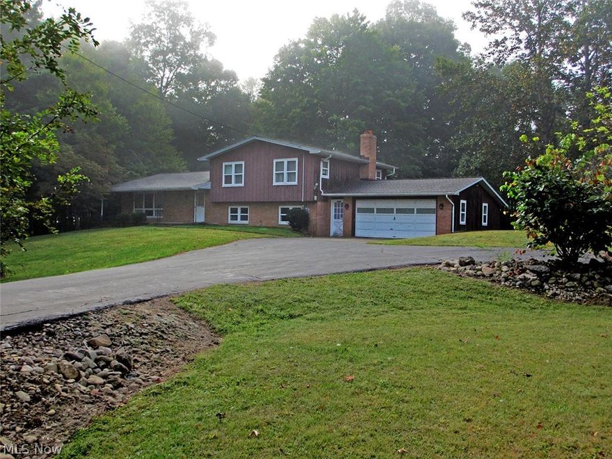 Absolute Auction, sells to the highest bidder on location on THURSDAY – OCTOBER 29, 2015 AT 5:30 PM.  Three Bedroom 2,260 Sq. Ft. Home On 8 Acres - 24’ x 24’ Detached Shop Building – Two Car Attached Garage - Nice Wooded Setting – Many Updates - Portage County – Paris Twp. – Southeast Local Schools. PROPERTY FEATURES: Home being built in 1967’ having approx. 2,260 sq. ft. Main level includes: kitchen, half bath, dining area, living room, and foyer entrance with closets. Lower level: family room w/ brick fireplace and sliding doors to back yard, office, half bath, laundry area. Upper level has full bath w/ double vanity and three bedrooms. Basement with oil hot water furnace, and breaker electric. Updates include: water heater, sump pump, pressure tank, Kinetico water system, some replacement windows, and roof shingles. Home is situated on a beautiful treed lot with 24’x24’ detached garage/shop building. Driveway access to the rear of the property; leads to an ideal pasture or tillable