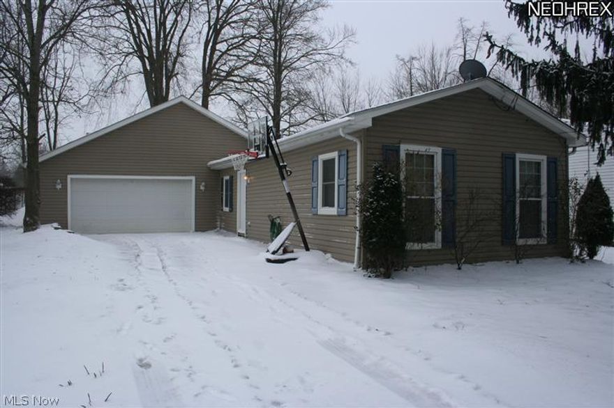Enjoy the renovations in this over 1500 square foot ranch.  With 3 bedrooms and 2.5 baths, this open floor plan was completely rebuilt and over 2/3 of the home is new construction.  Kitchen and baths have all been remodeled and all appliances will stay. The family room shows a floor to ceiling stone gas fireplace with a wall mount tv which remains with the home. Includes conveniences of an attached 2 car garage, 1st floor laundry, a storage shed and the sought after Aurora School District.  Newer roof, furnace/ AC, and windows.  Come see today!