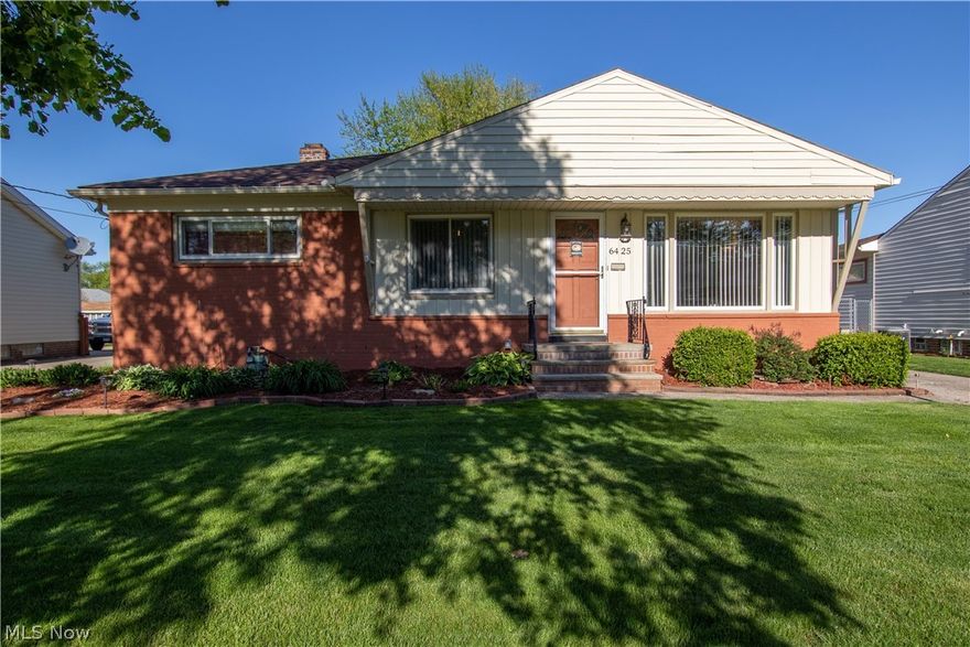 Welcome to 6425 Anita Drive! This Parma Heights ranch is nestled in the heart of the Big Creek Metropark and just steps away from shopping, dining, and more. Step inside to an open living room with lots of natural light. A dining area overlooks the lush backyard, is spacious enough for hosting, and flows neatly into the updated kitchen. Granite countertops, a tile backsplash, a stainless sink, and stainless appliances make this the perfect spot for any chef! Down the hall, discover three generously sized bedrooms, sharing a full bathroom with an updated vanity. The partially finished lower level offers even more living space, along with a second full bathroom and laundry hook-ups. Outside, catch a sunset on the patio, overlooking the partially fenced yard. An oversized two-car garage neatly houses your lawn equipment and more!