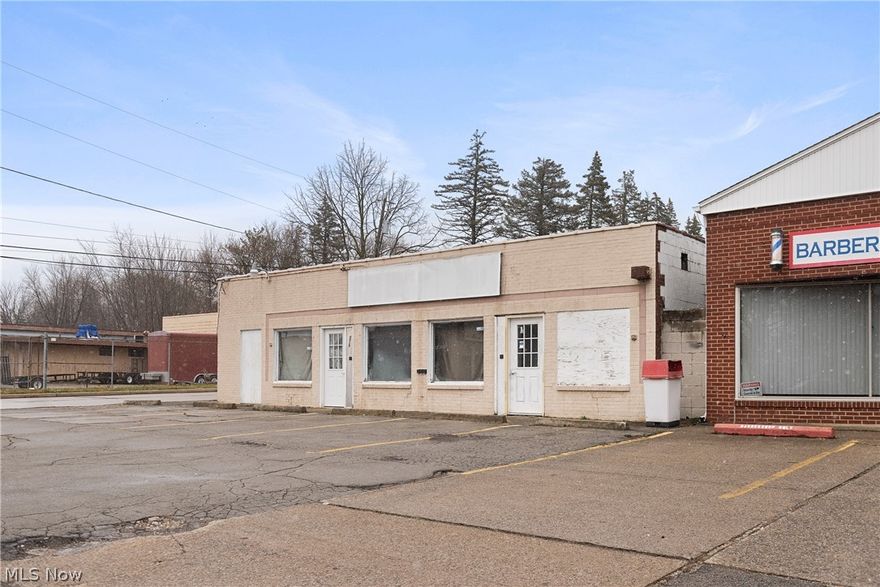 mixed use. 1)  Residential apartment two bedroom, kitchen, livingroom, familyroom, kitchen and laundry, double garage, porch and patio. 2) Parcially remodled rtail/office space, intended as a Doctors office. Rooms include 24 X 12 reception area, 10 X 21 waiting room, a multi use open space of 24 X 18, 5 exam rooms that average in size of 10 X 8. and a public bathroom.  Interior remodeling is about 70% completed.