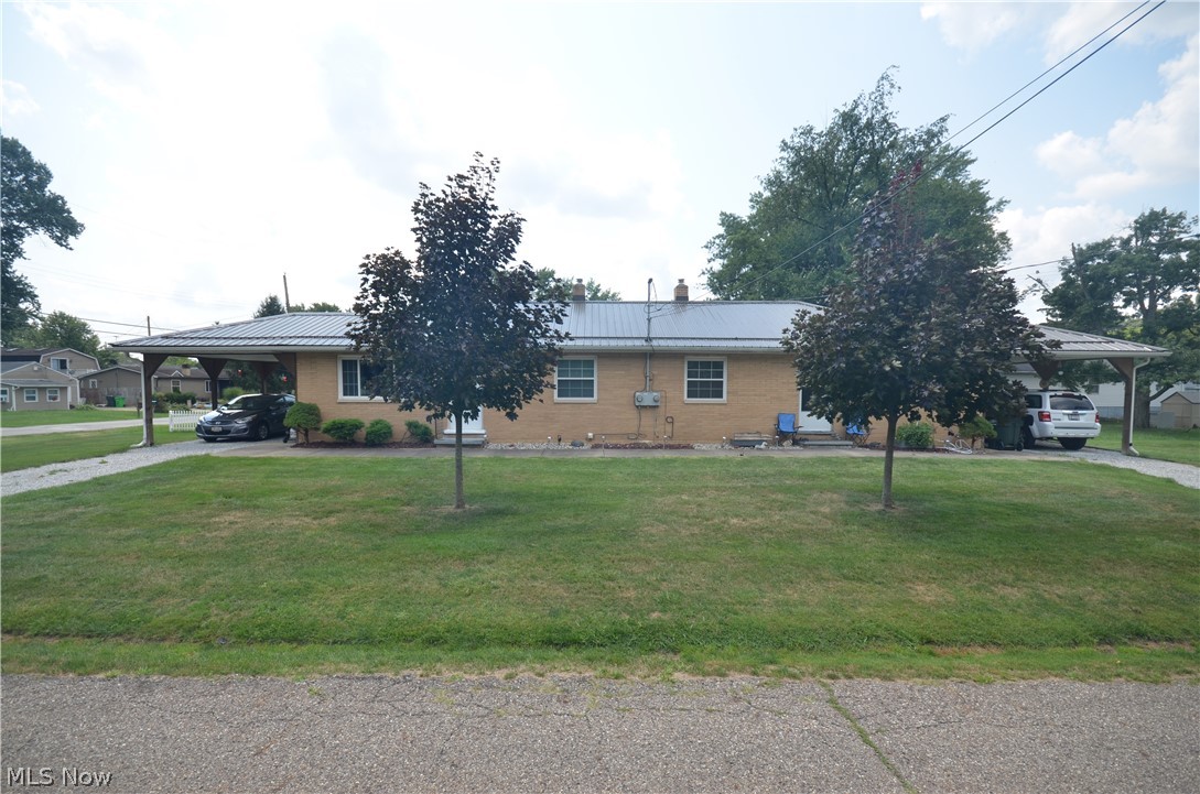 Beautifully updated ranch style 2 unit. LOW MAINTENANCE- all brick exterior, metal roof, updated triple pane windows. Both units have Central Air Conditioning, remodeled kitchens with granite counter tops and remodeled bathrooms with custom tile showers and full basements w laundry hookup and separate utilities! Each unit has a private driveway with covered carport. Excellent layout with living room featuring LVT flooring, eat in kitchen w LVT flooring, updated cabinets, 2 bedrooms, remodeled bathroom, full basement w glass block windows and each unit has some paneling up for semi-finished space in the basement. Current rents are below market value. 1100 (Month to Month) is Section 8- paying $650 ($270 paid by Housing Assistance Payment and $380 paid by tenant) and 1104 (month to month) pays $700. Owner pays Akron Water/Sewer/Trash currently. Electric, Gas and Water/Sewer are all metered separately. Ranges and Refrigerators are owned by the landlord and will transfer with the property. Hot Water Tanks were replaced in 2022. ALL UPDATED SINCE 2017: Metal Roof, Triple Pane Windows, Furnaces, ACs, Kitchens, Baths, Gutters with 5" returns- This one is mint condition and you don't want to miss it! Windows purchased through Window World- owner believes they offer a warranty to buyers of the property that can be purchased - contact Window World for details.