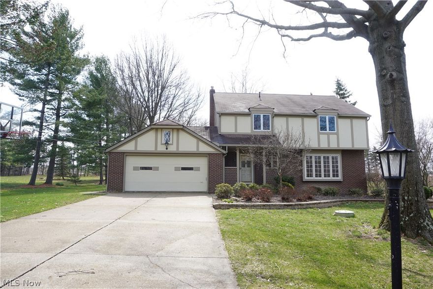 Desirable Rustic Hills colonial 4 bedroom 2.5 bath family home in the Highland Local School District.  This well loved home features an open floor plan with family room, dining room and living room.  The kitchen opens to the living room with a cozy wood burning fireplace.  Fresh paint and new flooring throughout most of the home.  Slider door from the dining room opens up to a private, treed backyard perfect for entertaining.  The yard also features an above ground pool with a new deck and pump! All four bedrooms are a great size. Master suite features a large bedroom, full bathroom and walk in closet. You'll find additional living space in the fully finished basement.  All appliances stay! Brand new AC unit. Truly nothing to do but move in!