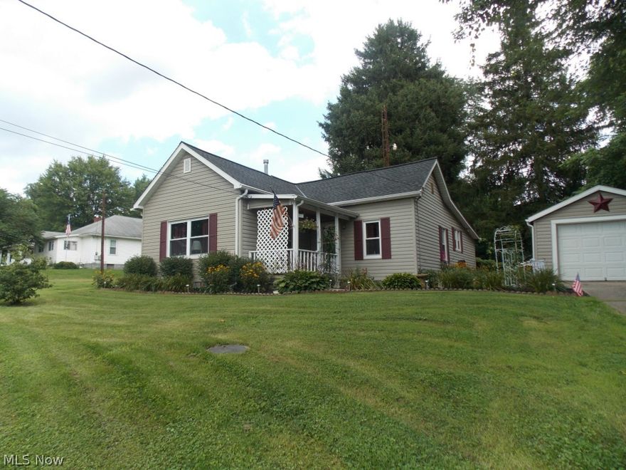 Come Take A Look At This Lovely 2 or 3 Bedroom Ranch Style Home. Main Floor Laundry Room. Completely Remodeled Bathroom. Cute Kitchen With Appliances Including Dishwasher. Beautiful Front Porch With Amazing Landscaping. Patio In Back For Relaxing or Cooking Out. Garage Has Workshop In Back. Concrete Basketball Court On Second Lot.